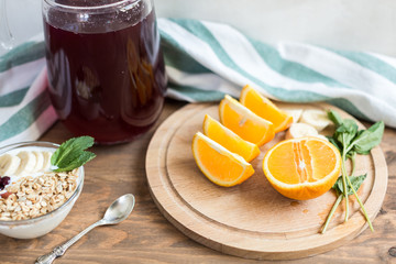Healthy and wholesome breakfast. Yogur with muesli and currants.