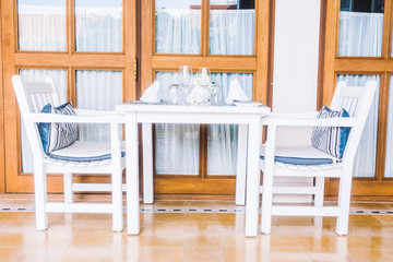 Empty table and chair