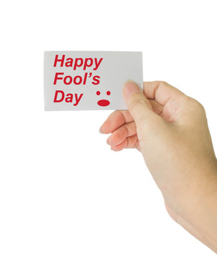 hand hold card with word Happy fool's day