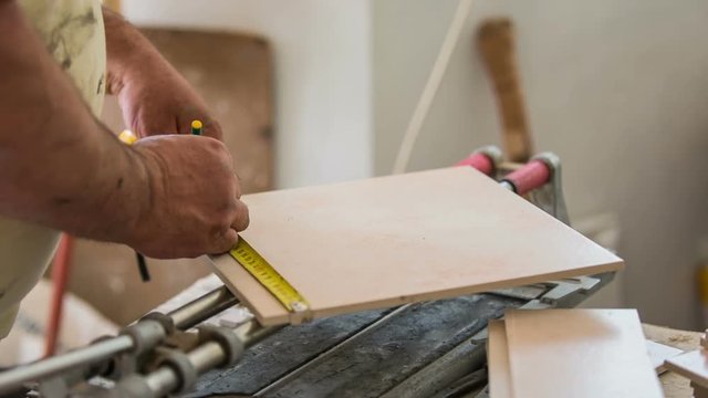 Marking ceramic tile before cutting close up