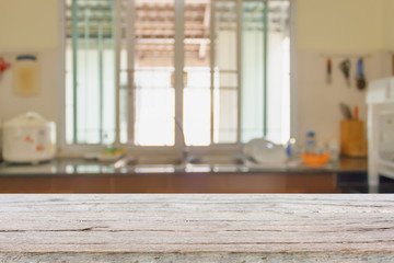 Wood table on kitchen sink interior background