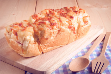 Bread ham cheese with hand with filter effect retro vintage style