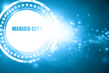 Blue stamp on a glittering background: mexico city