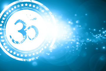 Blue stamp on a glittering background: Om sign icon