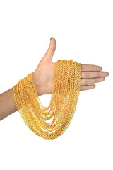 gold necklace on hand