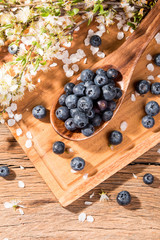 blueberries on wooden table. Blueberry antioxidant. Concept for healthy eating and nutrition © verca