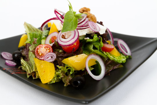 Image of tasty greek salad on dish
