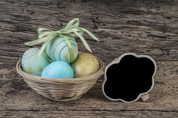 colorful easter eggs on wooden table