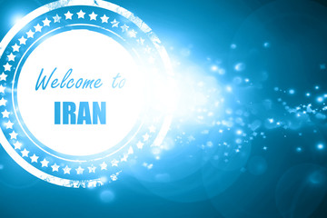 Blue stamp on a glittering background: Welcome to iran