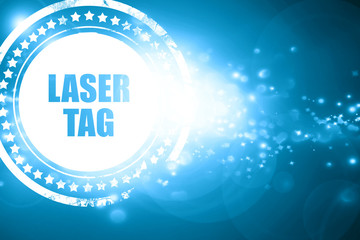 Blue stamp on a glittering background: laser tag sign background