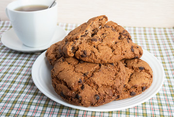 Cup of tea and cookies with chocolate 