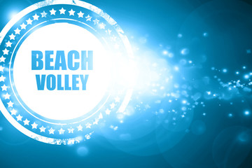 Blue stamp on a glittering background: beach volley sign