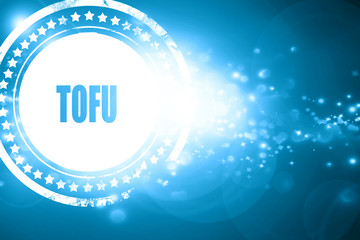 Blue stamp on a glittering background: Delicious tofu sign
