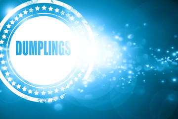 Blue stamp on a glittering background: Delicious dumplings sign