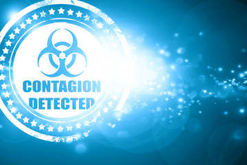 Blue stamp on a glittering background: Contagion concept backgro