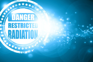 Blue stamp on a glittering background: Nuclear danger background