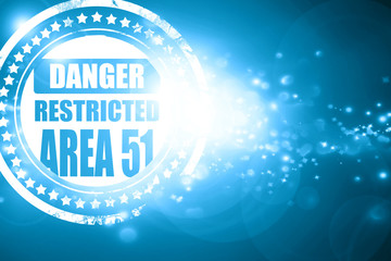 Blue stamp on a glittering background: area 51 sign