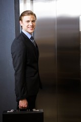 Businessman waiting for elevator