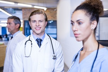 Fototapeta premium Portrait of male doctor smiling in hospital