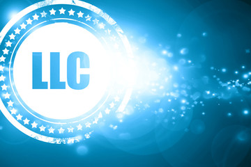 Blue stamp on a glittering background: llc