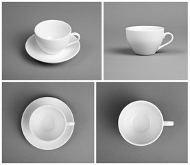 Collection of empty white cups on gray background