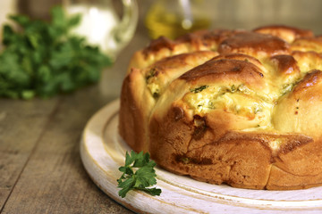 Yeast cake with feta and greens.
