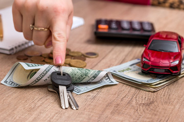 red toy car with money