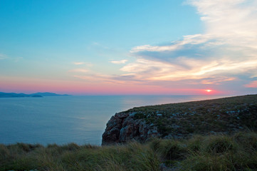 Minorca, Isole Baleari, Spagna: il tramonto dal faro di Cap de Cavalleria l'8 luglio 2013