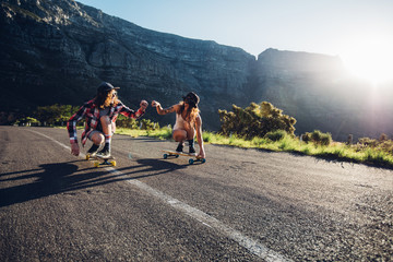Best friends having fun with skateboard © Jacob Lund