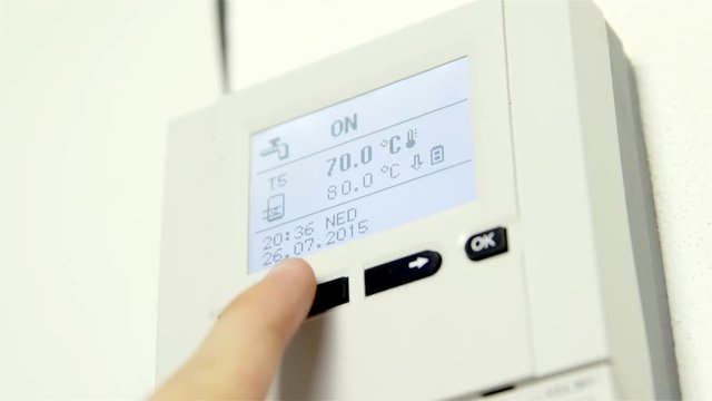 Pushing buttons on temperature status panel