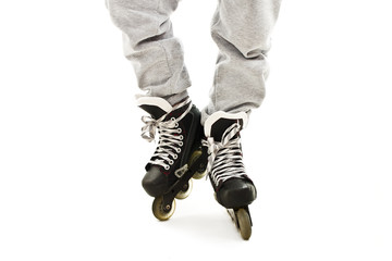 
Close up a Boy Legs in Roller Skates. Isolated On White Background 