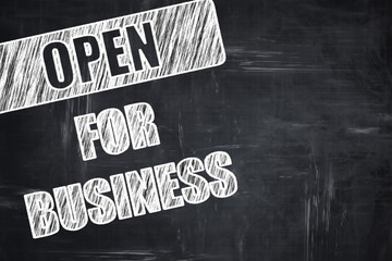 Chalkboard writing: Open for business sign