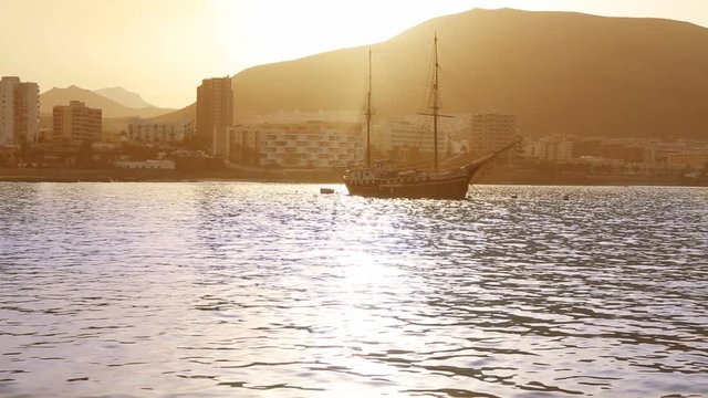 Los Cristianos beach in Arona Tenerife south vintage boat at Canary Islands of Spain