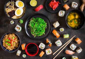 Table served with sushi and traditional japanese food