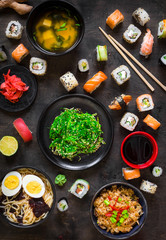 Table served with sushi and traditional japanese food