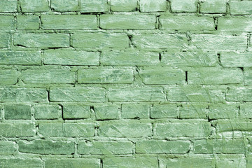 Green brick wall texture. The background of the brickwork.