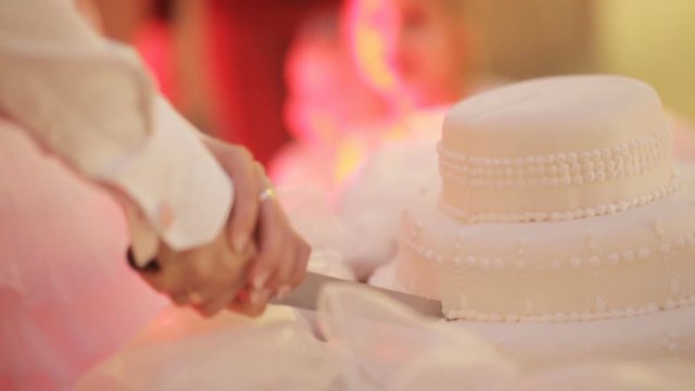 Cutting wedding cake
