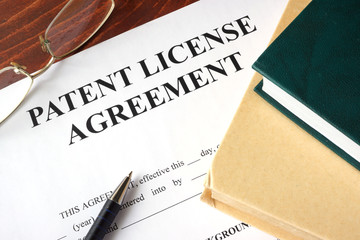 Patent License agreement on a table. Copyright concept. - obrazy, fototapety, plakaty