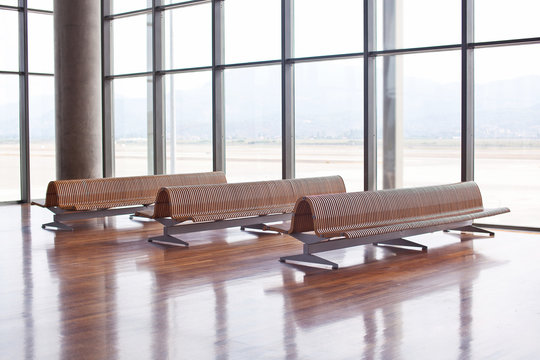 Benches in the waiting area of an airport