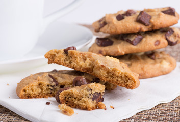 Closeup of Chocolate Chip Cookies With a Coffee Cup
