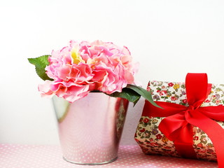 gift box and beautiful flowers bouquet with space for copy
