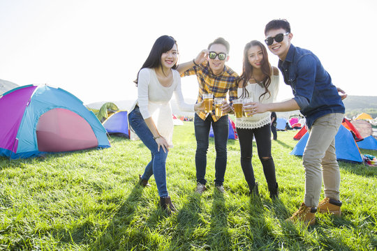 Happy friends at music festival