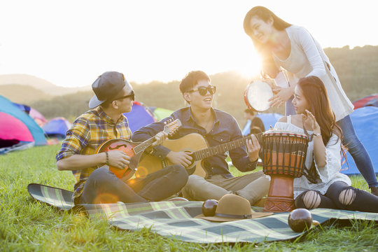 Happy friends at music festival