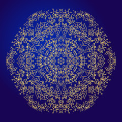 Mandala, amulet. Esoteric gold symbol on a blue background.