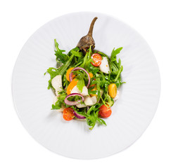 Baked eggplant salad with fresh vegetables.