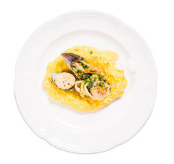 Delicious scallops and mussels with polenta.