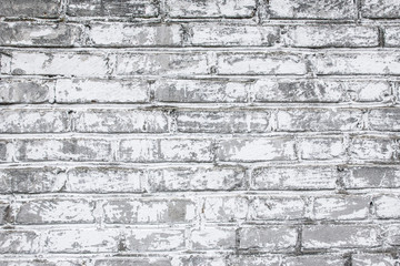 Grunge white gray brick wall background.