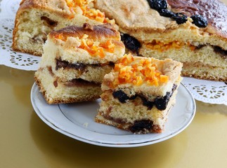 sweet bun with almonds ,cherries and orange skin