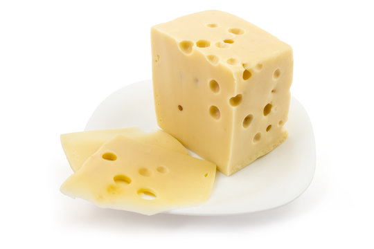 Slice of fresh emmental cheese on white plate and white background, cow cheese