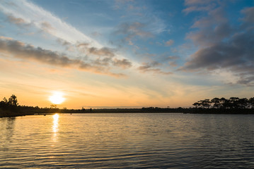 Fototapeta na wymiar Sunrise over the lake.